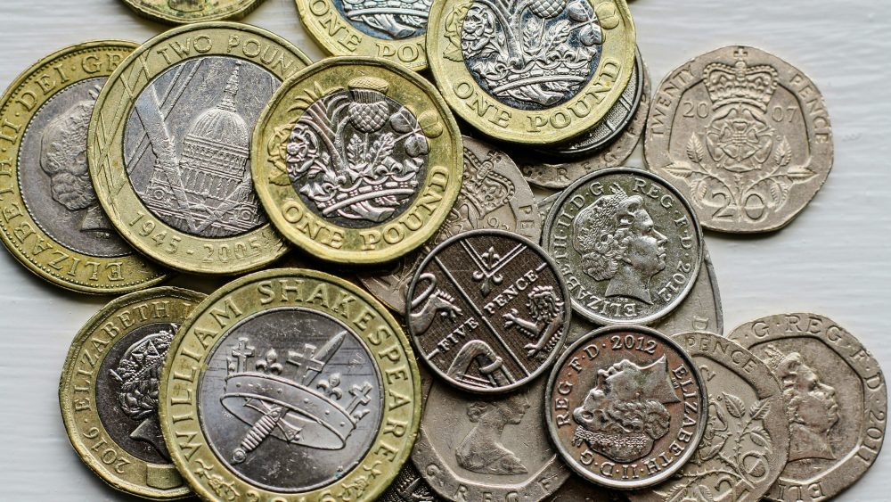 Cash, represented by a pile of coins.