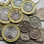 Cash, represented by a pile of coins.