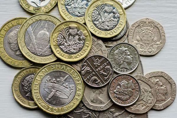 Cash, represented by a pile of coins.